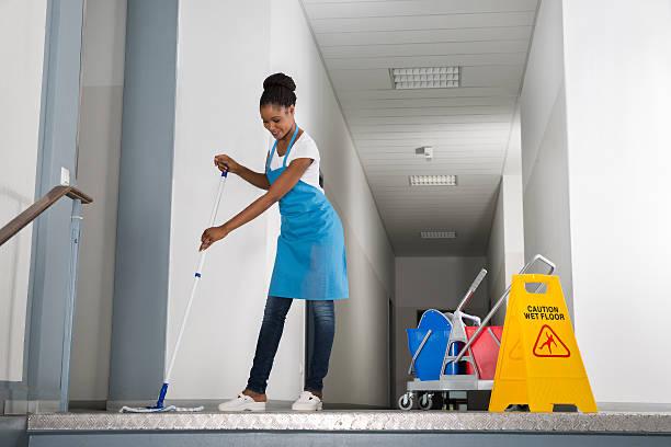 Cleaner cleaning the floor